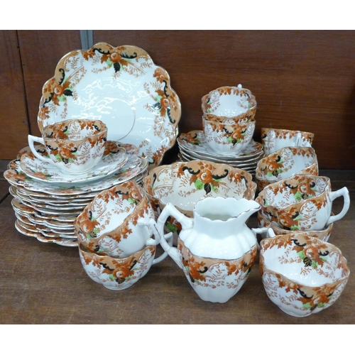 691 - An early 20th Century tea service, Mayer-Sherratt, Longton, 12 trios, 2 plates, milk jug and sugar *... 