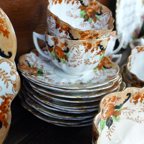 691 - An early 20th Century tea service, Mayer-Sherratt, Longton, 12 trios, 2 plates, milk jug and sugar *... 