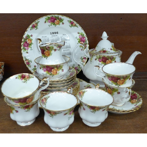 692 - Royal Albert Old Country Roses teaware; six cups, six saucers, six side plates, sugar, teapot, cake ... 