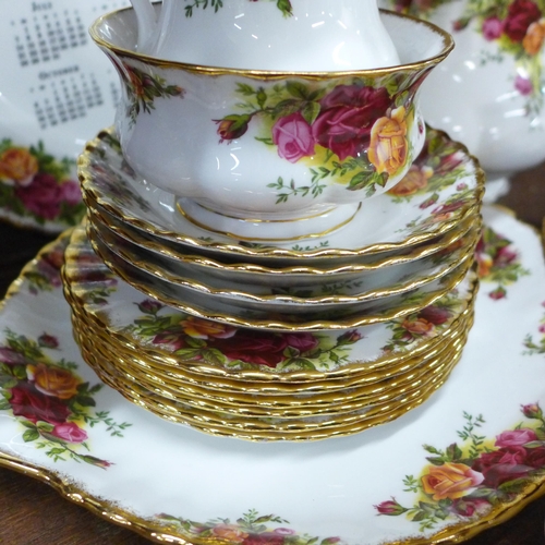 692 - Royal Albert Old Country Roses teaware; six cups, six saucers, six side plates, sugar, teapot, cake ... 