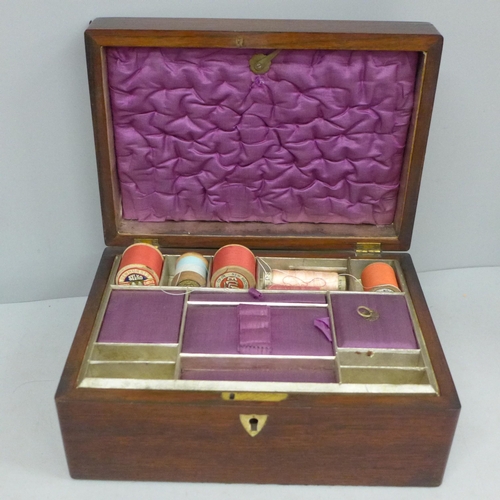 703 - A wooden sewing box with mother of pearl inlay