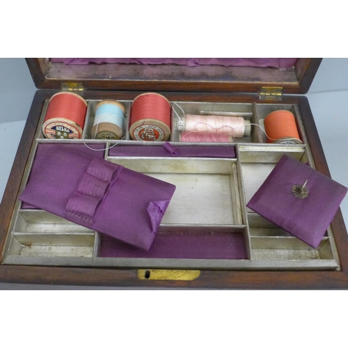 703 - A wooden sewing box with mother of pearl inlay