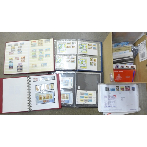 706 - Stamps; a box of Isle of Man stamp albums, covers, booklets, presentation packs, etc.