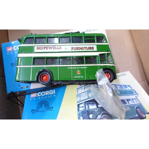 717 - Eight Corgi Classics model vehicles including a Nottingham trolley bus, all boxed