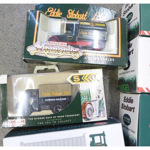 721 - A collection of Eddie Stobart items, boxed lorries, calendar, etc.