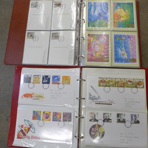 749 - An album of 1990s stamps first day covers and an album of first day issue PHQ Post Office Picture Ca... 