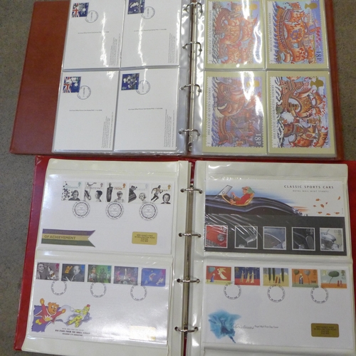 749 - An album of 1990s stamps first day covers and an album of first day issue PHQ Post Office Picture Ca... 