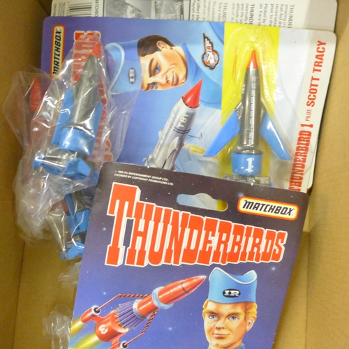 769 - A collection of Matchbox Thunderbirds figures and rescue vehicles