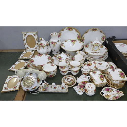 776 - A large quantity of Royal Albert Old Country Roses china including a telephone, clock, trinket boxes... 