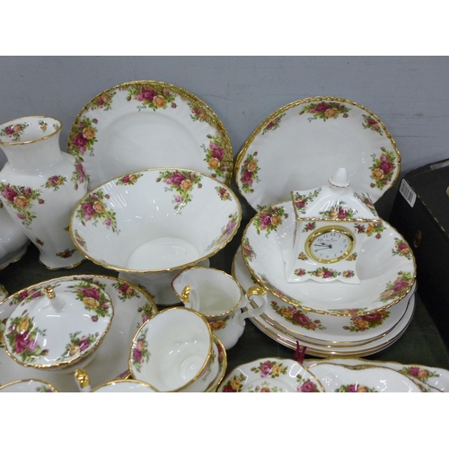 776 - A large quantity of Royal Albert Old Country Roses china including a telephone, clock, trinket boxes... 