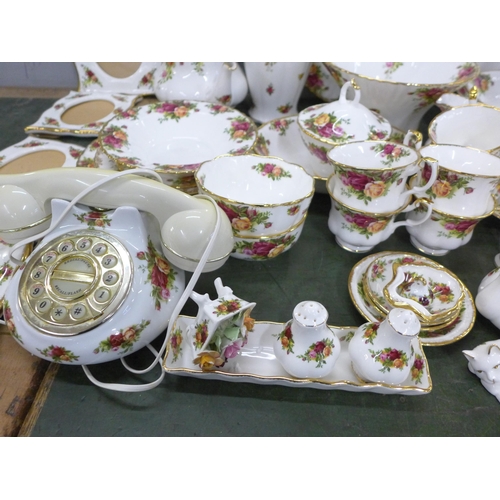 776 - A large quantity of Royal Albert Old Country Roses china including a telephone, clock, trinket boxes... 