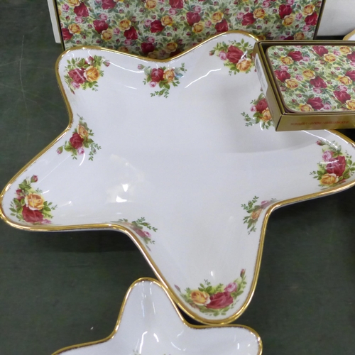 778 - A collection of boxed Royal Albert Old Country Roses and Rose Chintz; one large sandwich platter thr... 