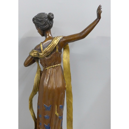 783 - A bronze Art Nouveau figure, 54cm