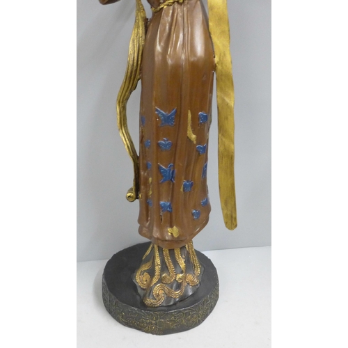 783 - A bronze Art Nouveau figure, 54cm