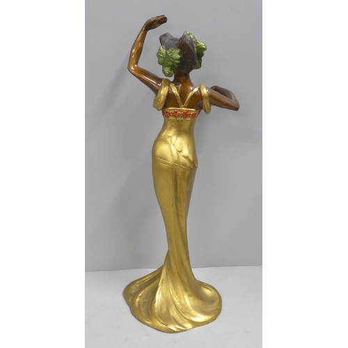 784 - An Art Nouveau figure of a lady, signed Bonnefond, 41cm