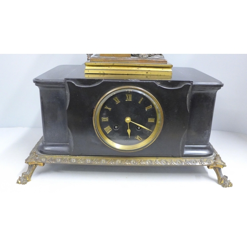 786 - A 19th Century French belge-noir mantel clock on a cast metal frame with patinated bronze sculpture ... 