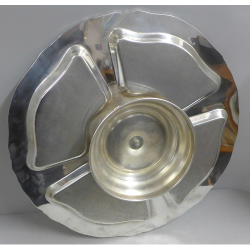 788 - A large silver plated hors d'oeuvres dish with cenral lidded preserve pot and four glass sections