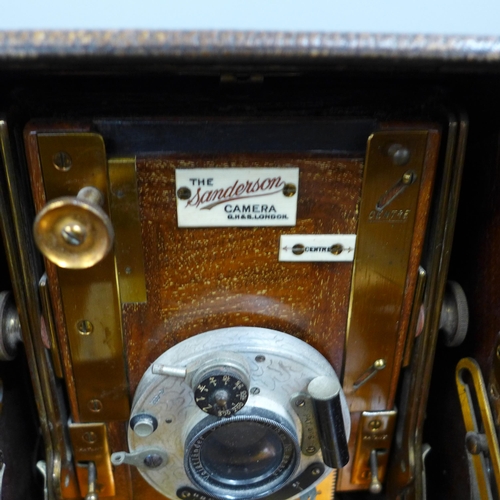 790 - The Sanderson camera, early 20th Century, with original record book, lenses and accessories