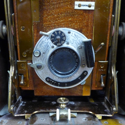 790 - The Sanderson camera, early 20th Century, with original record book, lenses and accessories