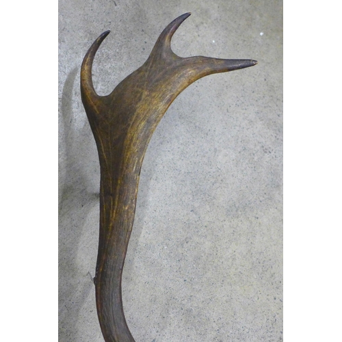 798 - A set of mounted antlers and two Indian swords
