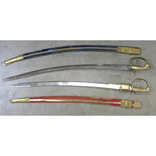 798 - A set of mounted antlers and two Indian swords