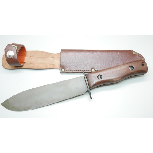 805 - A Wilkinson RAF survival knife, with scabbard