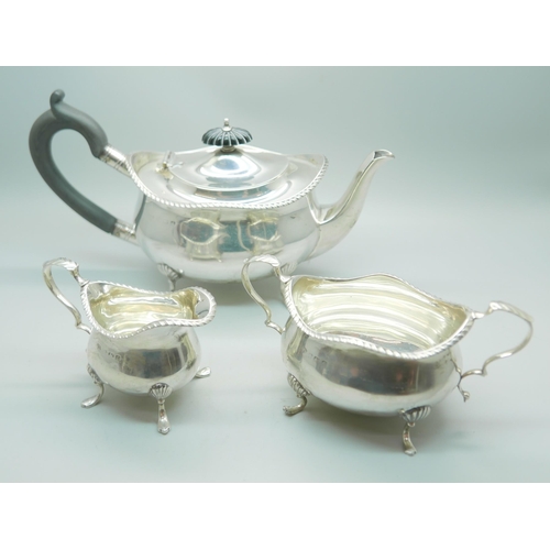 814 - A three piece silver bachelors tea service, Birmingham 1927, 540g