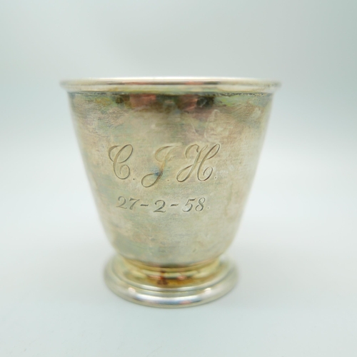 819 - A silver Christening cup, Birmingham 1957, 91g, 7cm, with inscription dated 1958