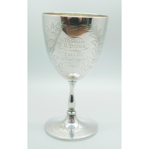 823 - A Victorian silver goblet, London 1879, with later inscription dated 1900, 133g, 13.5cm, a/f