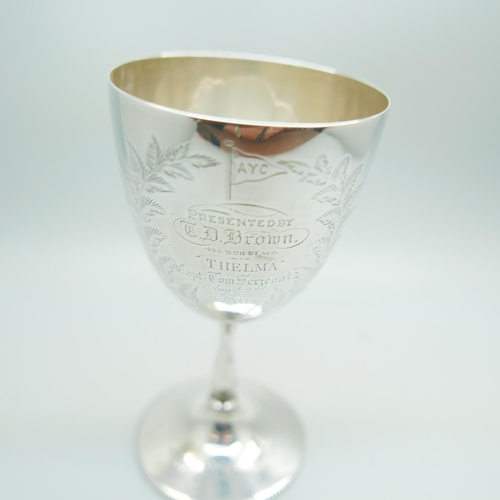 823 - A Victorian silver goblet, London 1879, with later inscription dated 1900, 133g, 13.5cm, a/f