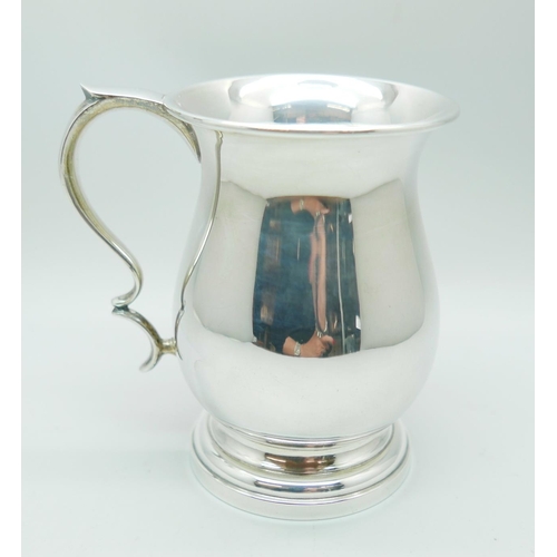 824 - A silver mug, J.C. Ltd., Birmingham 1976, 190g