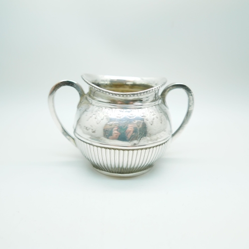 830 - A Victorian silver, engraved and fluted two handled bowl, worn London mark, 160g