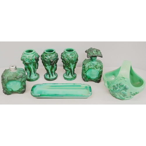 837 - In the manner of Heinrich Hoffmann; seven items of malachite glass, three vases depicting raised fig... 