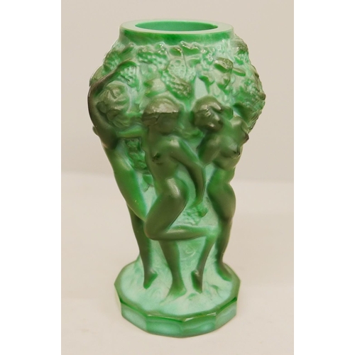 837 - In the manner of Heinrich Hoffmann; seven items of malachite glass, three vases depicting raised fig... 