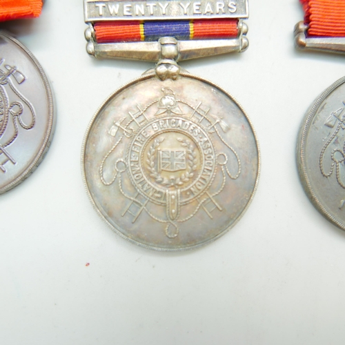 839 - A silver Fire Brigade Long Service medallion, three other Fire Brigade medallions and two other meda... 