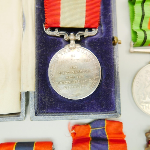 839 - A silver Fire Brigade Long Service medallion, three other Fire Brigade medallions and two other meda... 