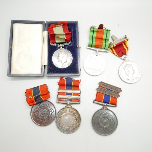 839 - A silver Fire Brigade Long Service medallion, three other Fire Brigade medallions and two other meda... 