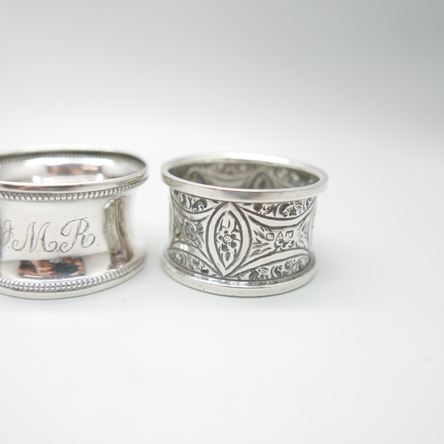 848 - A pair of silver napkin rings, Chester 1911, and four others, 100g