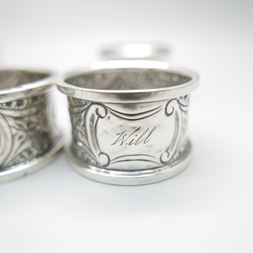 848 - A pair of silver napkin rings, Chester 1911, and four others, 100g