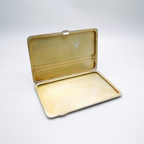 850 - A silver cigarette case with a hallmarked 9ct gold release button and gilt interior, London 1931, Sa... 