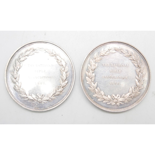 864 - Two National Rifle Association silver medallions, 1860, 106.7g, 46mm