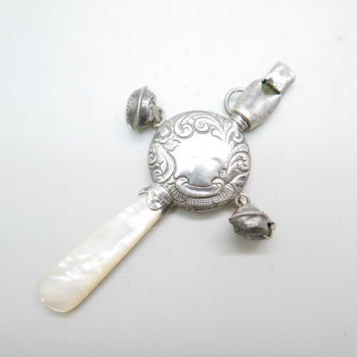 865 - A baby's silver rattle with mother of pearl handle, Birmingham 1904, a/f