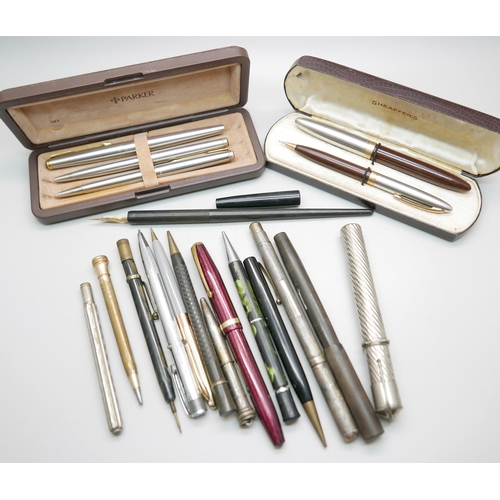 902 - A collection of pens and pencils