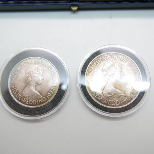 906 - Two commemorative coins in a presentation box; 25th Wedding anniversary silver coins