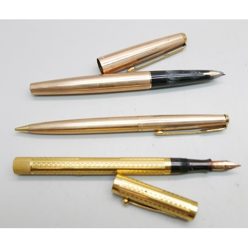 908 - Three gold plated pens, two Parker and a Waterman