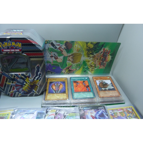 923 - Three boxes of Pokemon Trading Cards including four sealed packs, Japanese issues, many in plastic s... 