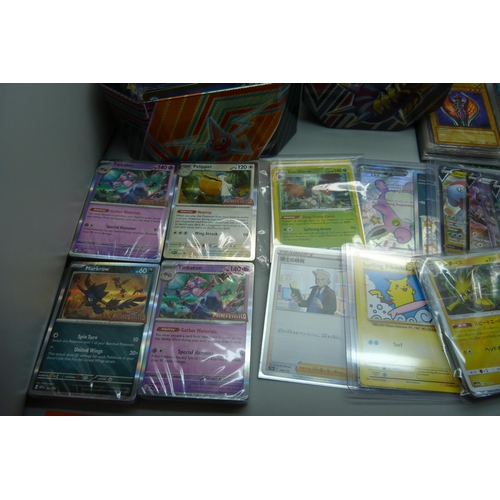 923 - Three boxes of Pokemon Trading Cards including four sealed packs, Japanese issues, many in plastic s... 