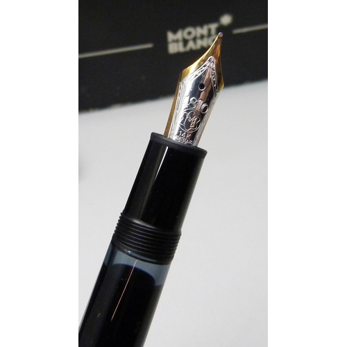 929 - A Mont Blanc Meisterstuck pen set, number 146 with original ink, serial number 104893