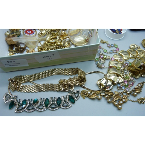 953 - A collection of gold toned jewellery including a Dior brooch, a 9ct gold wristwatch and two Butler a... 