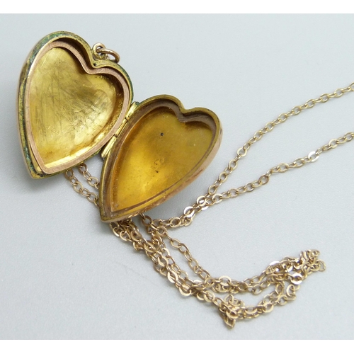 964 - A 9ct gold locket, Birmingham 1906, on a 9ct gold chain, 4.5g